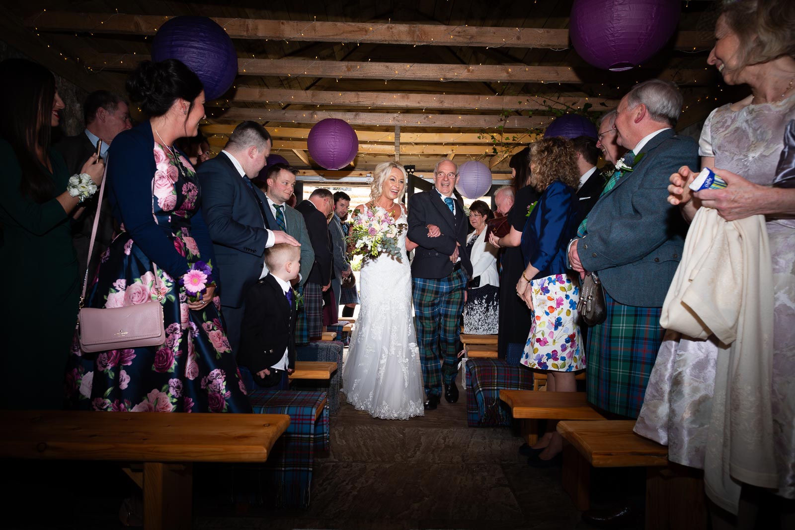 Eilidh walks down the aisle before her wedding to Lewis accompanied by her Dad.