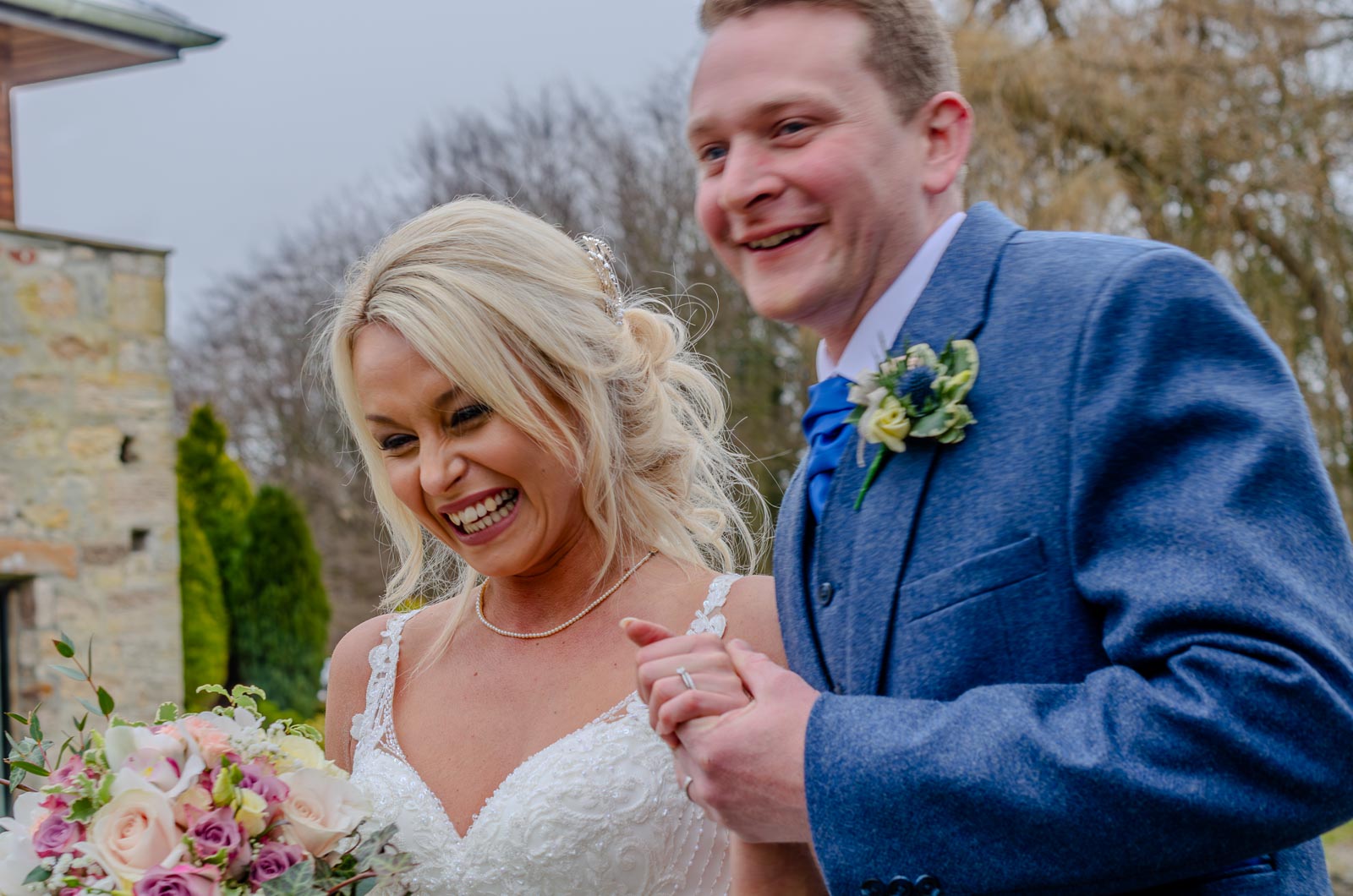 Lewis and Eilidh smile after their wedding.