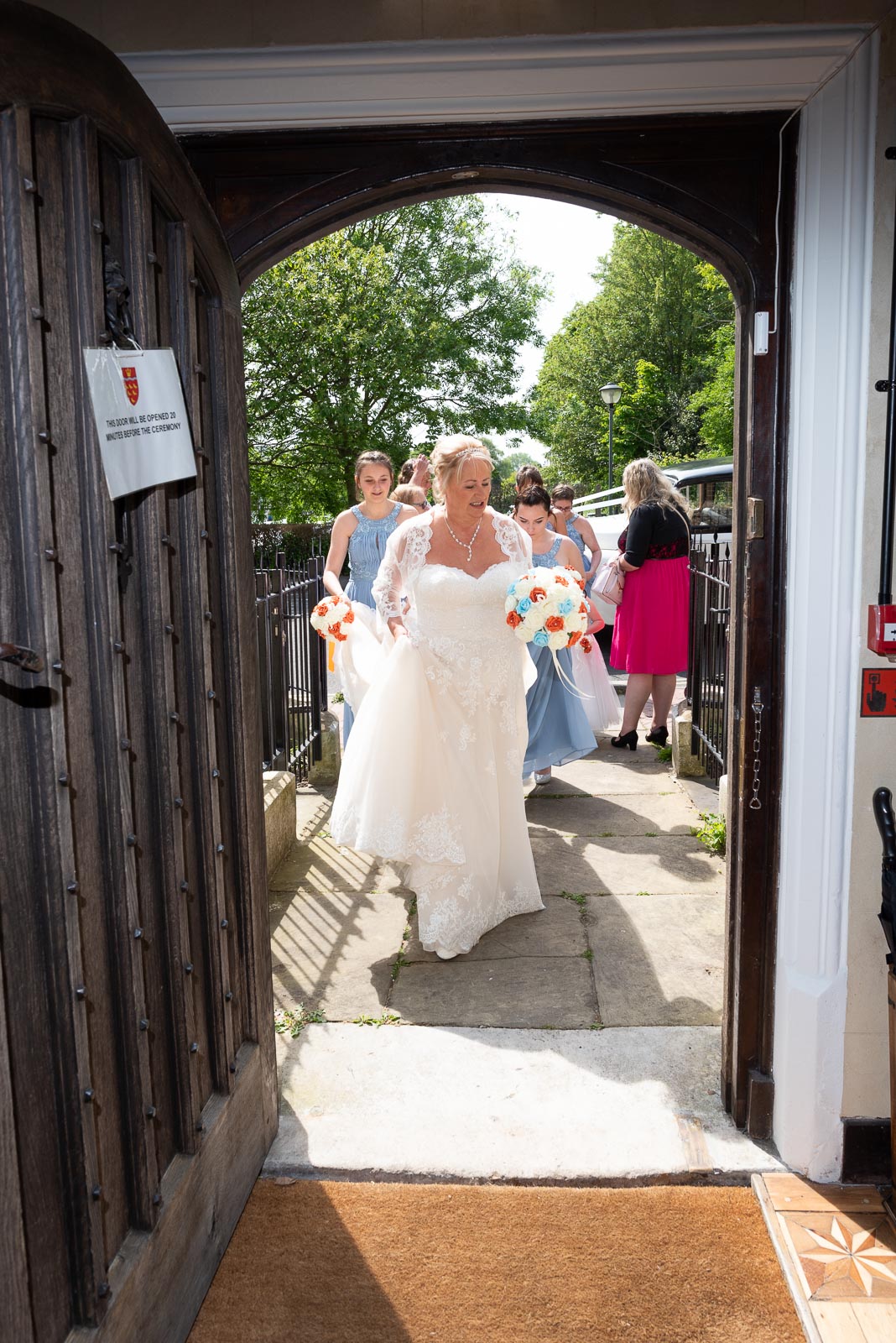 Wendy enters the front door at Lewes Register Wedding before her wedding.