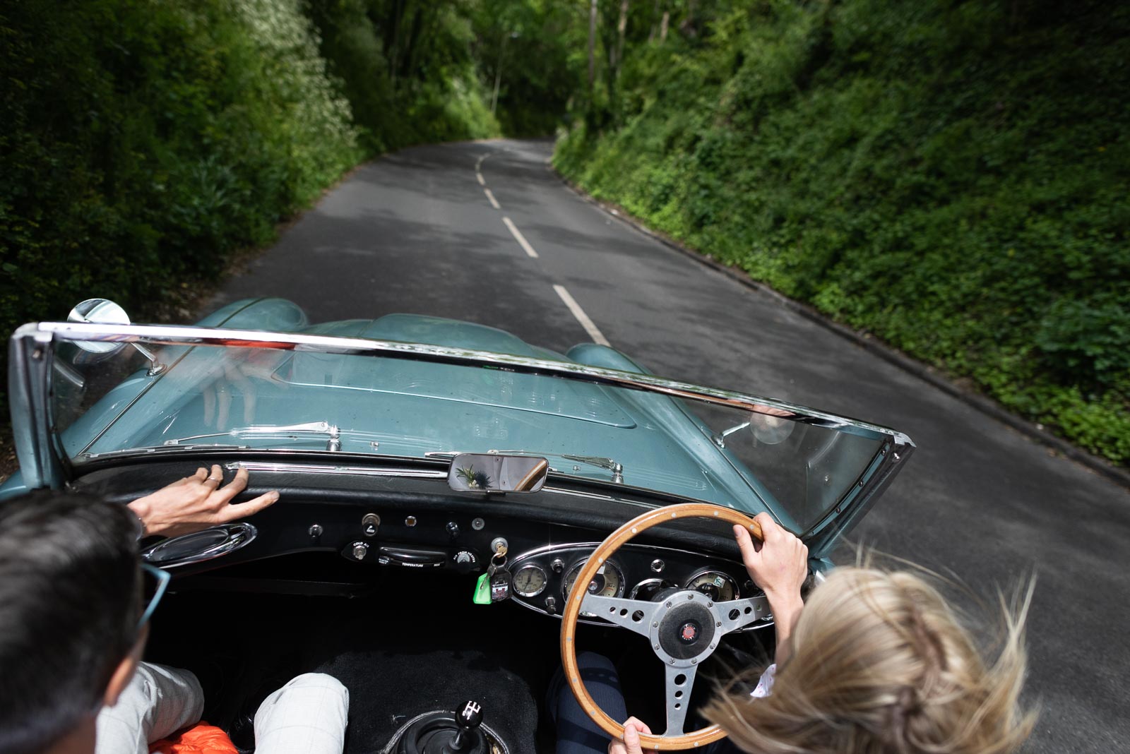 Kate and Sam drive down Winterborne Hallow in Lewes after their wedding.