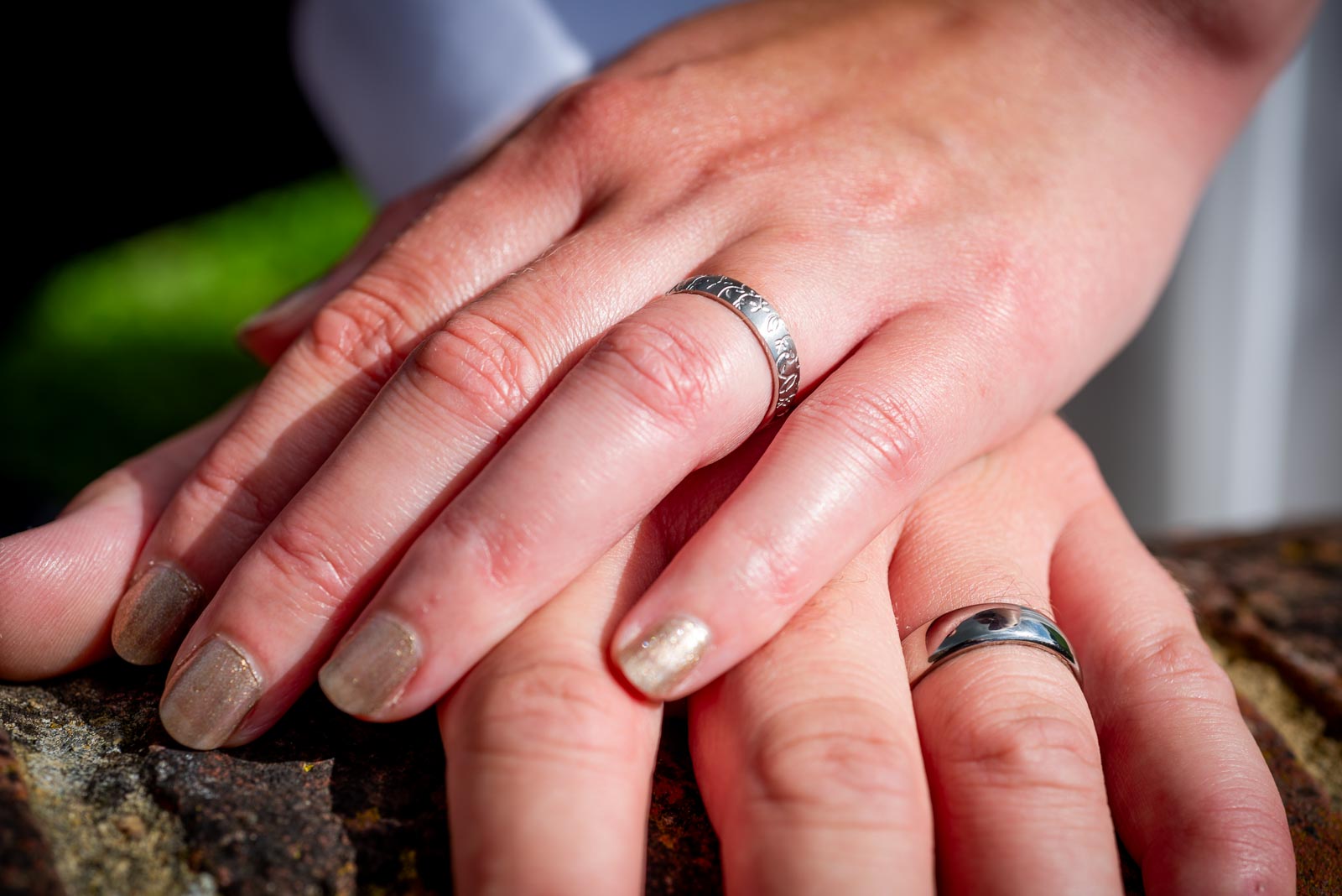 A close up shot of Adrienn and Lee's rings after their wedding at Milwards Farm Estate near Lewes. 