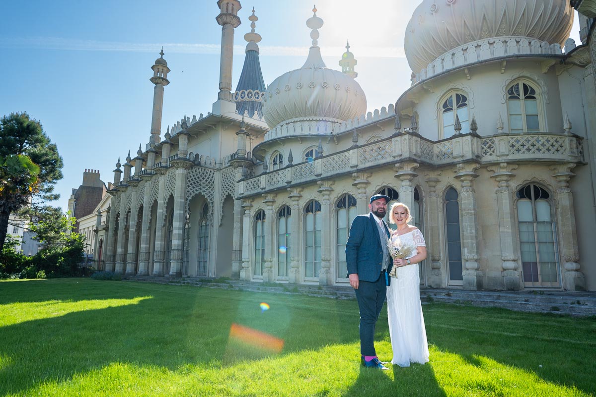 Georgina and Andy enjoy some bright sunshine after their wedding outside the Royal Pavilion in Brighton.