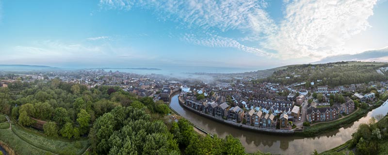 Drone shot of Lewes looking over the River Ouse from The Railway Land.